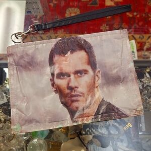 Couture planet Tom Brady wristlet